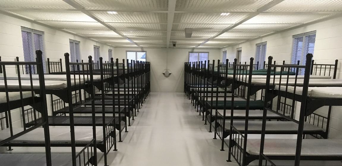 Construction Repairs at TSA Barracks 5 (Exterior & Interior Work, Retention Wall, HVAC, Plumbing, Epoxy Flooring) - San Diego, CA