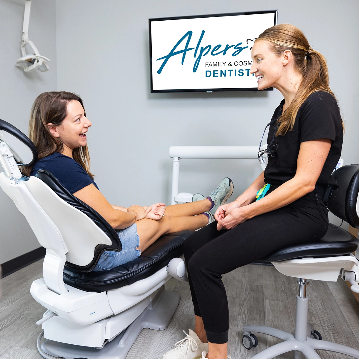 Dental hygienist talking with a patient at Alpers Family and Cosmetic Dentistry in Scottsdale