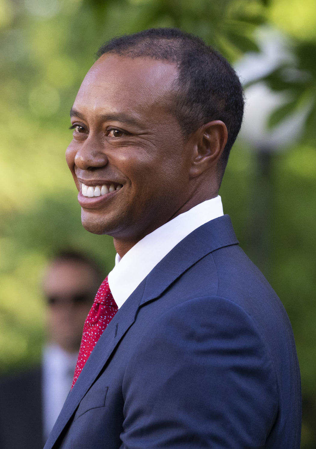 tiger woods tooth knocked out smiling before