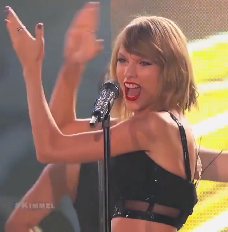 Taylor Swift performing on Jimmy Kimmel Live in 2015, likely still rocking the chipped tooth from her Red Tour mishap, even if you can’t quite spot it here. | Photo Credit: Nicole Alexander