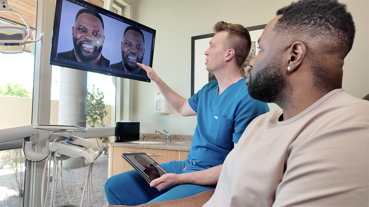 Dr. Alpers providing a custom smile simulation to a Scottsdale patient at their cosmetic consultation