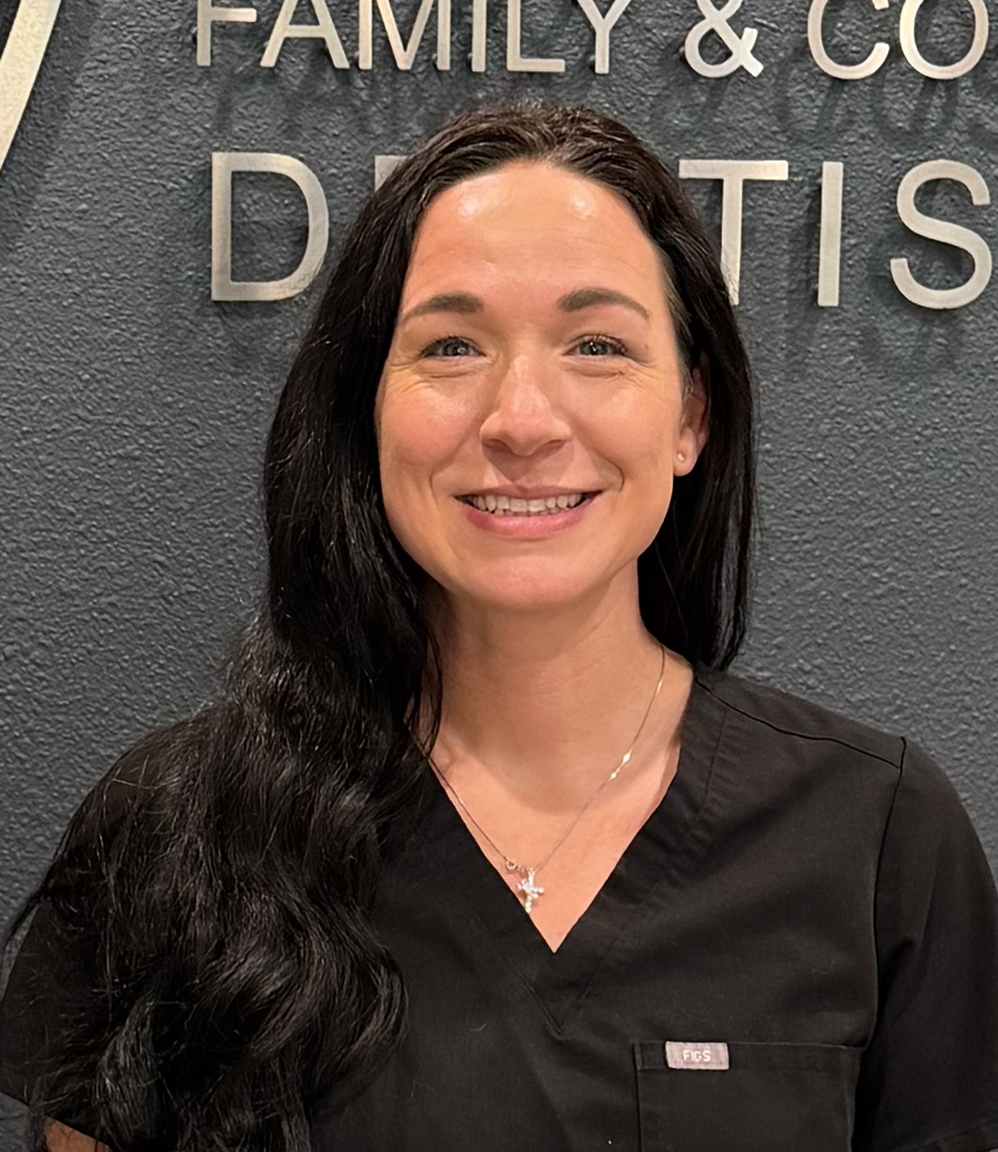 Tara, dental assistant, smiling at Alpers Family and Cosmetic Dentistry in Scottsdale, AZ