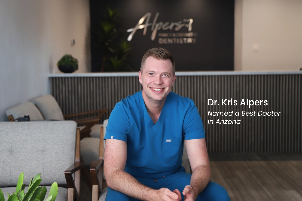 Dr. Kris Alpers, Scottsdale dentist and owner of Alpers Family and Cosmetic Dentistry, seated in the practice lobby