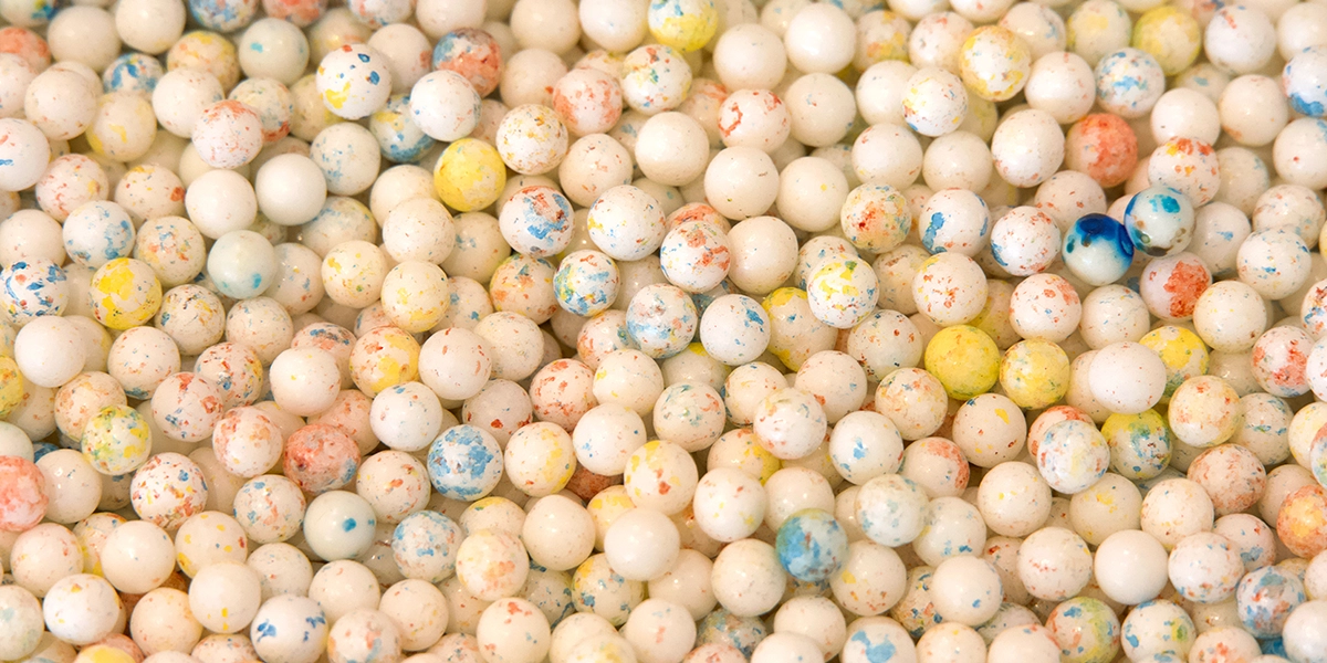 Colorful speckled jawbreaker candies, a hard Halloween candy that can expose teeth to sugar for extended periods.