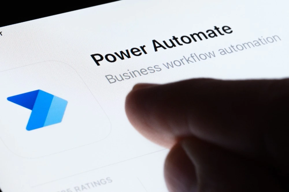 A person pointing at the Power Automate application