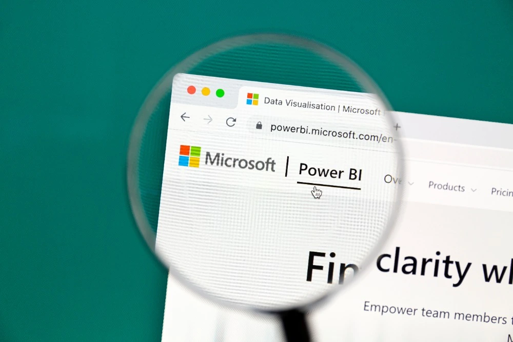 A magnifying glass over the words Power Apps