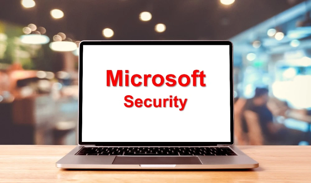 Laptop displaying the text Microsoft Security