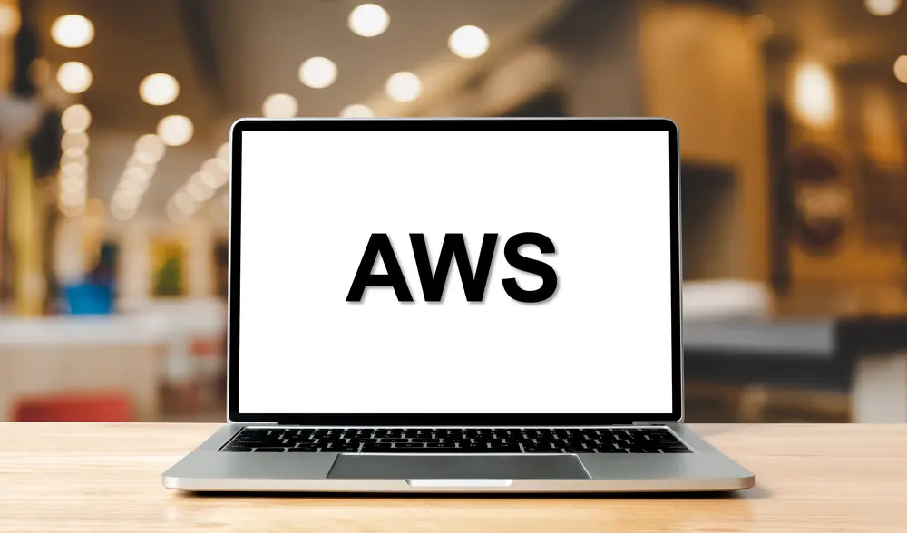 Laptop displaying the text AWS