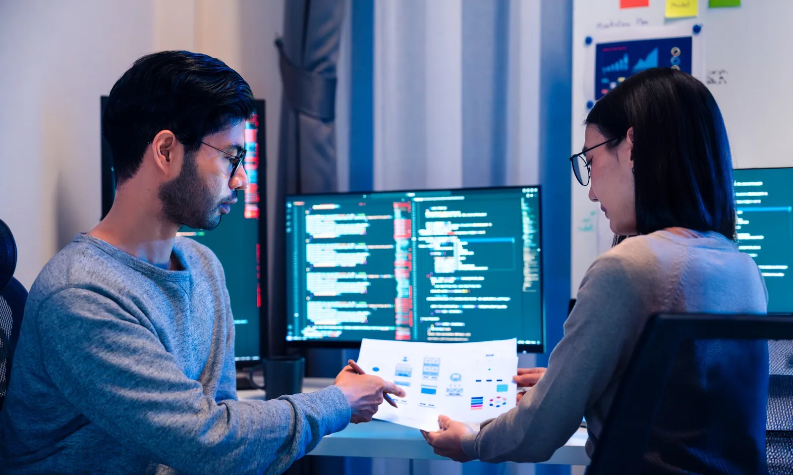 DevOps professionals collaborating on software development and delivery