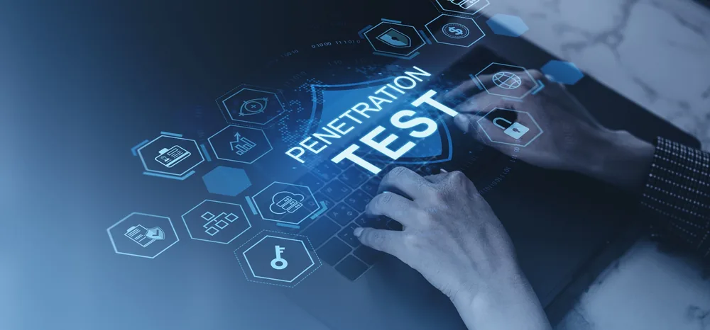 Cyber security professional carrying out penetration testing on a laptop