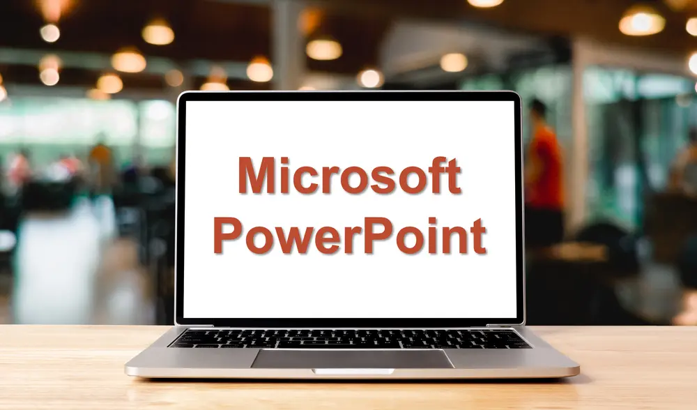 Laptop displaying Microsoft PowerPoint