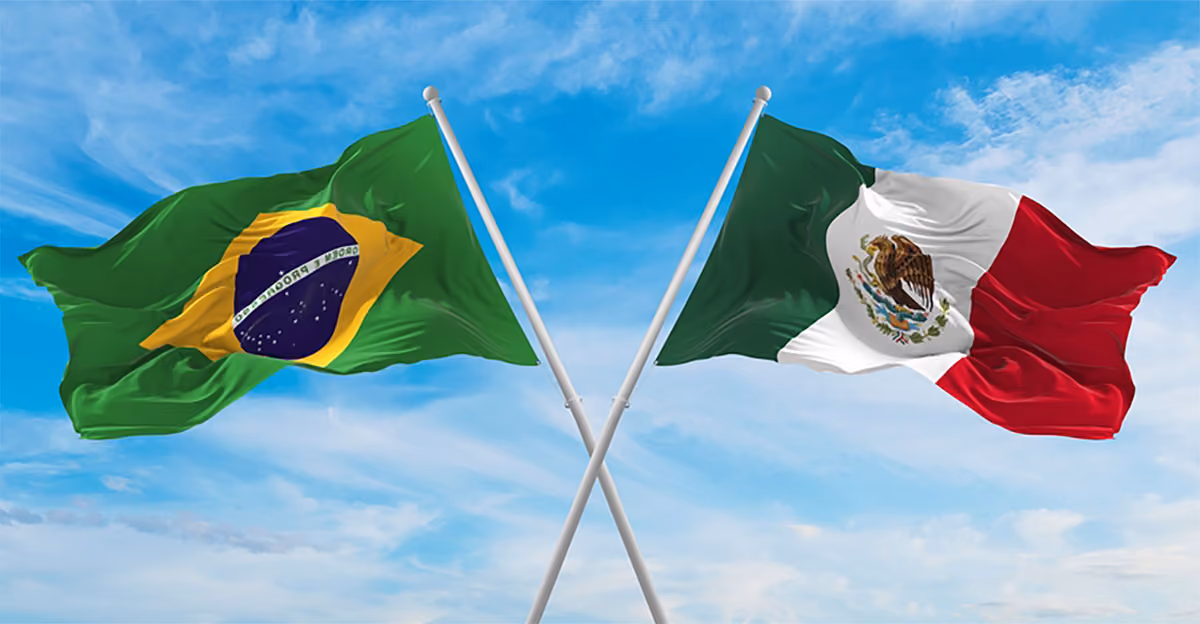 Bandeira do Brasil e do México cruzadas indicando parceria entre os dois países.