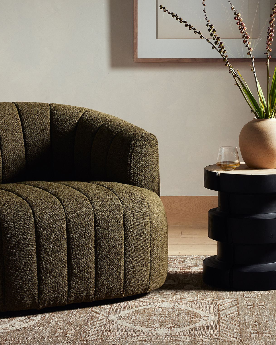 A woman and a man blurred in the background, holding keys in the foreground.