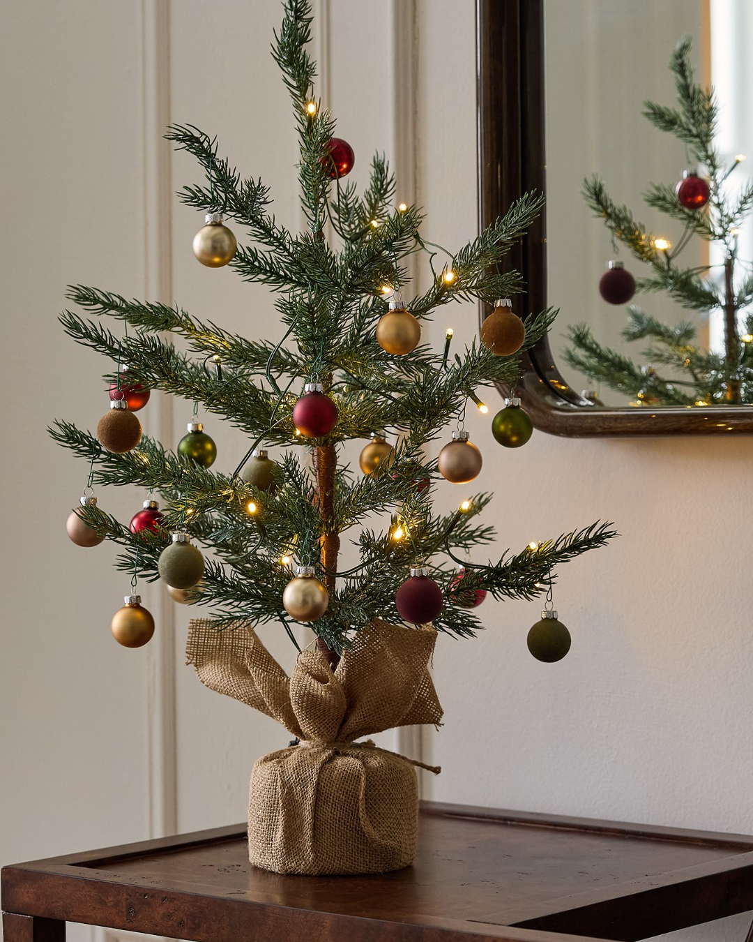 A woman and a man blurred in the background, holding keys in the foreground.
