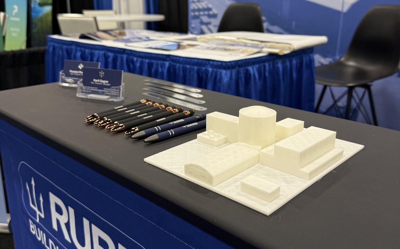 3D-printed model of the Three Mile Island structure on the stand counter