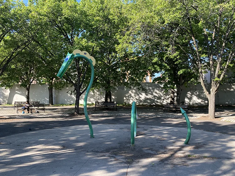 The splash pad at Hoyt Playground looks like a dragon