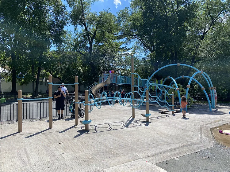 the sun is strong at the javits playground and hot