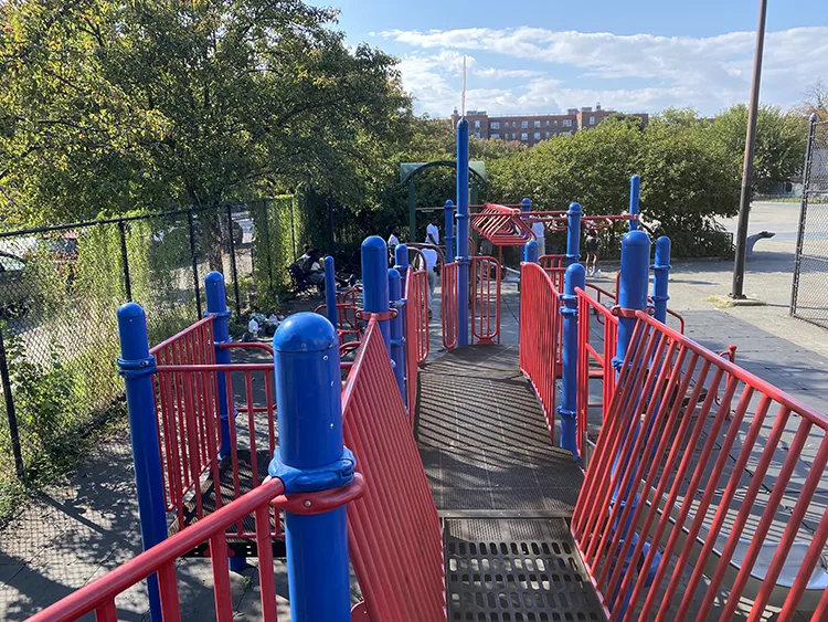 Looking down at the equipment at bush clinton playground in red hook brooklyn