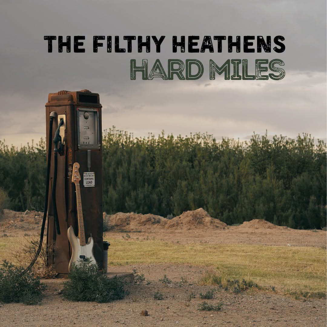The Filthy Heathens’ “Hard Miles” cover art showing a guitar leaning against an old gas pump.