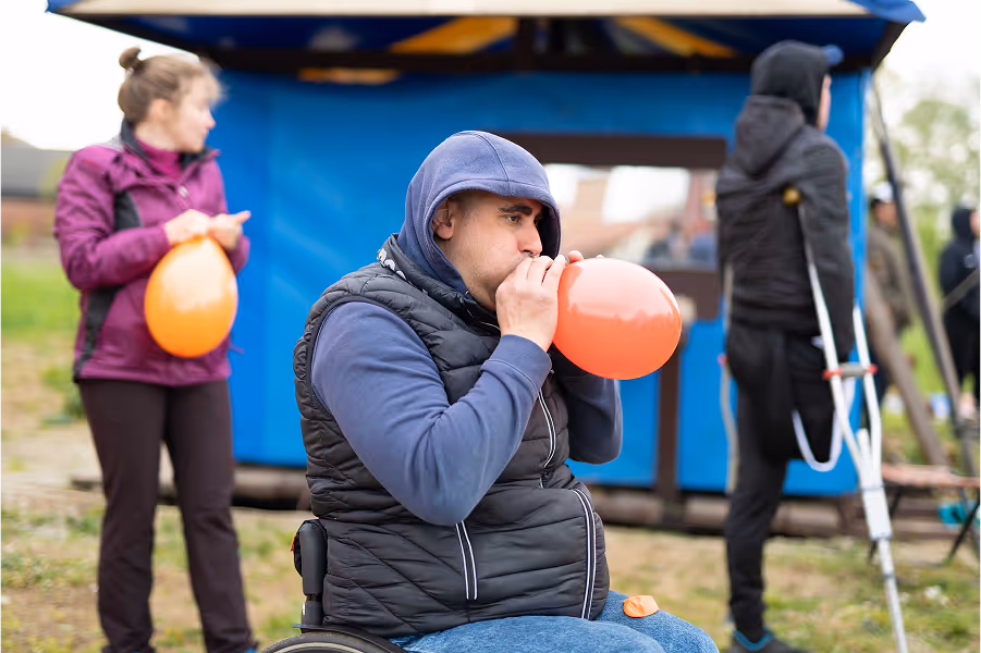man blow the balloon