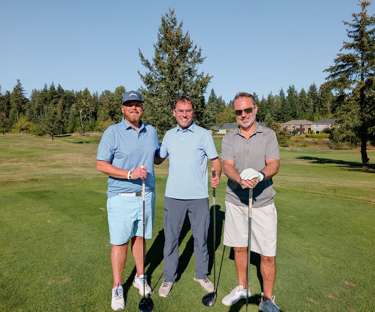 Three golfers on the course before a round
