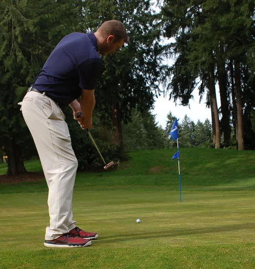 Golfer putting