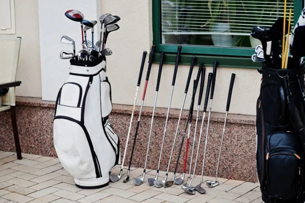 Golf clubs outside a porch
