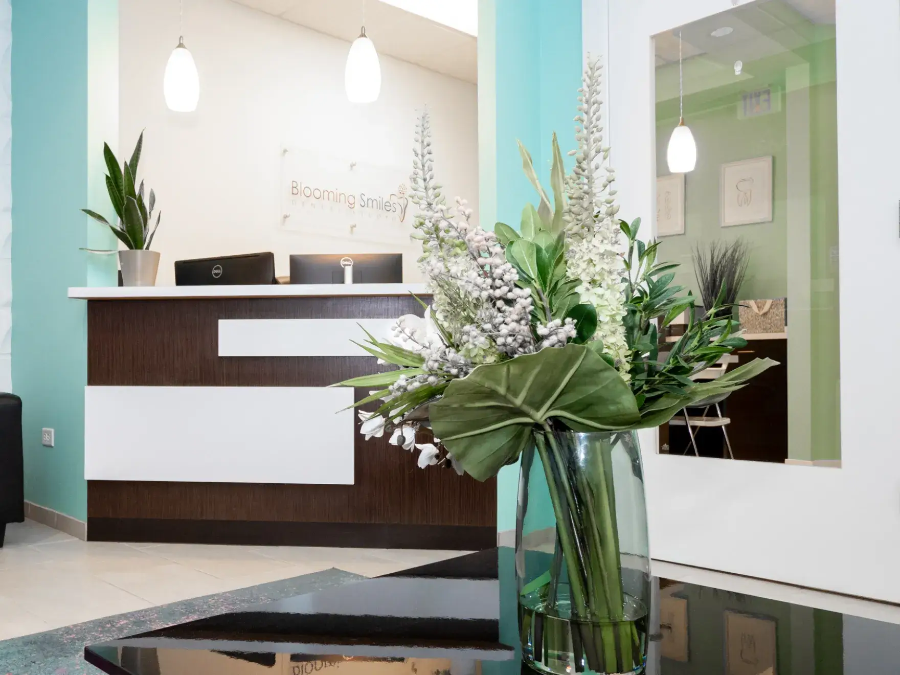 a vase filled with flowers sitting on top of a table