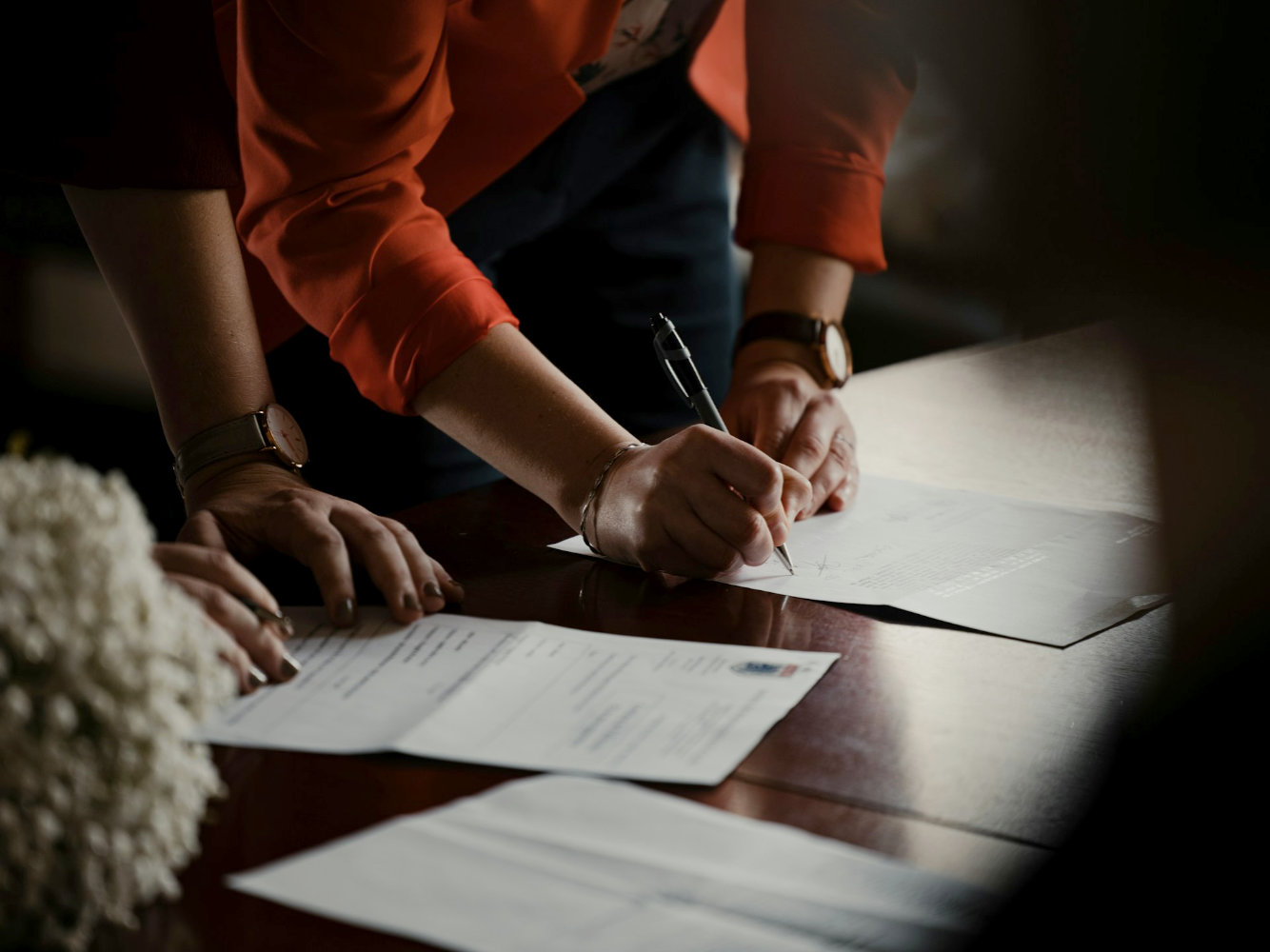 Person signing documentation