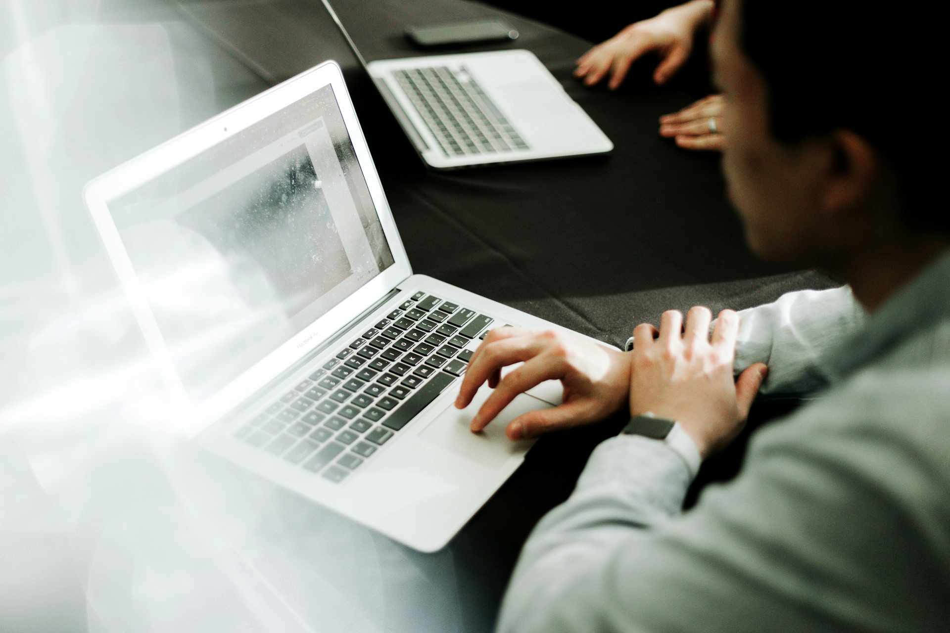 Person looking into a computer screen