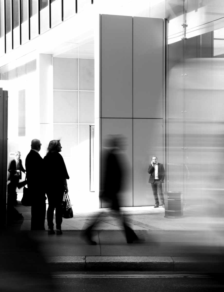 Business people walking around