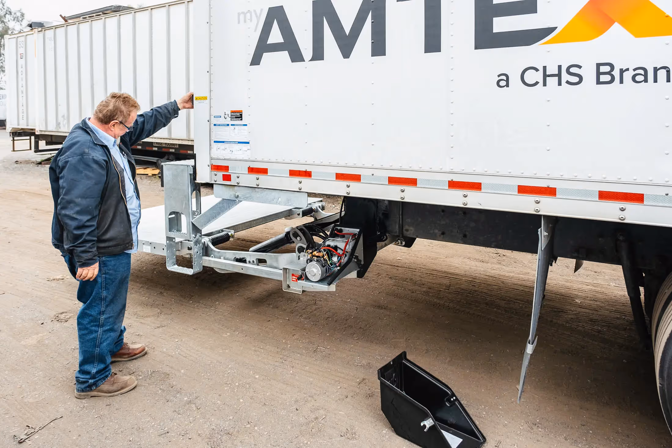 Mechanic performing lift gate repairs in Clearwater, FL