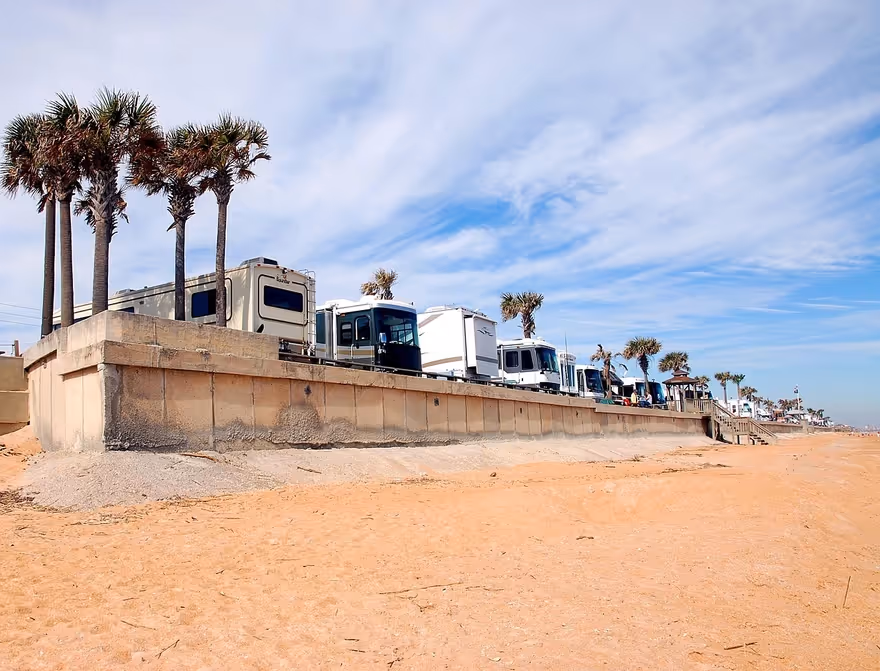 RVs parked at a beachside camp ground in Florida