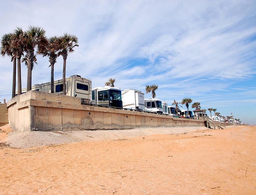 RVs parked at a beachside camp ground in Florida