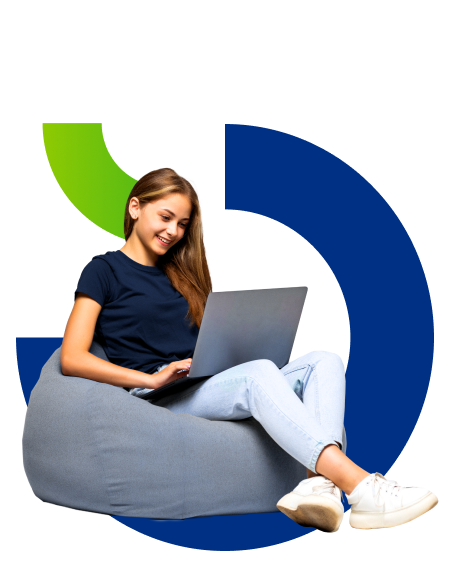 A young woman sitting on a couch with a laptop