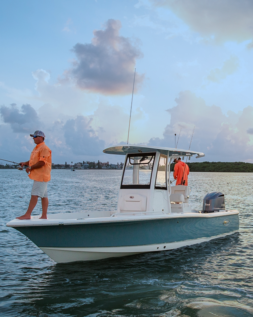 Two pontoon boats driving next to each other on open waters