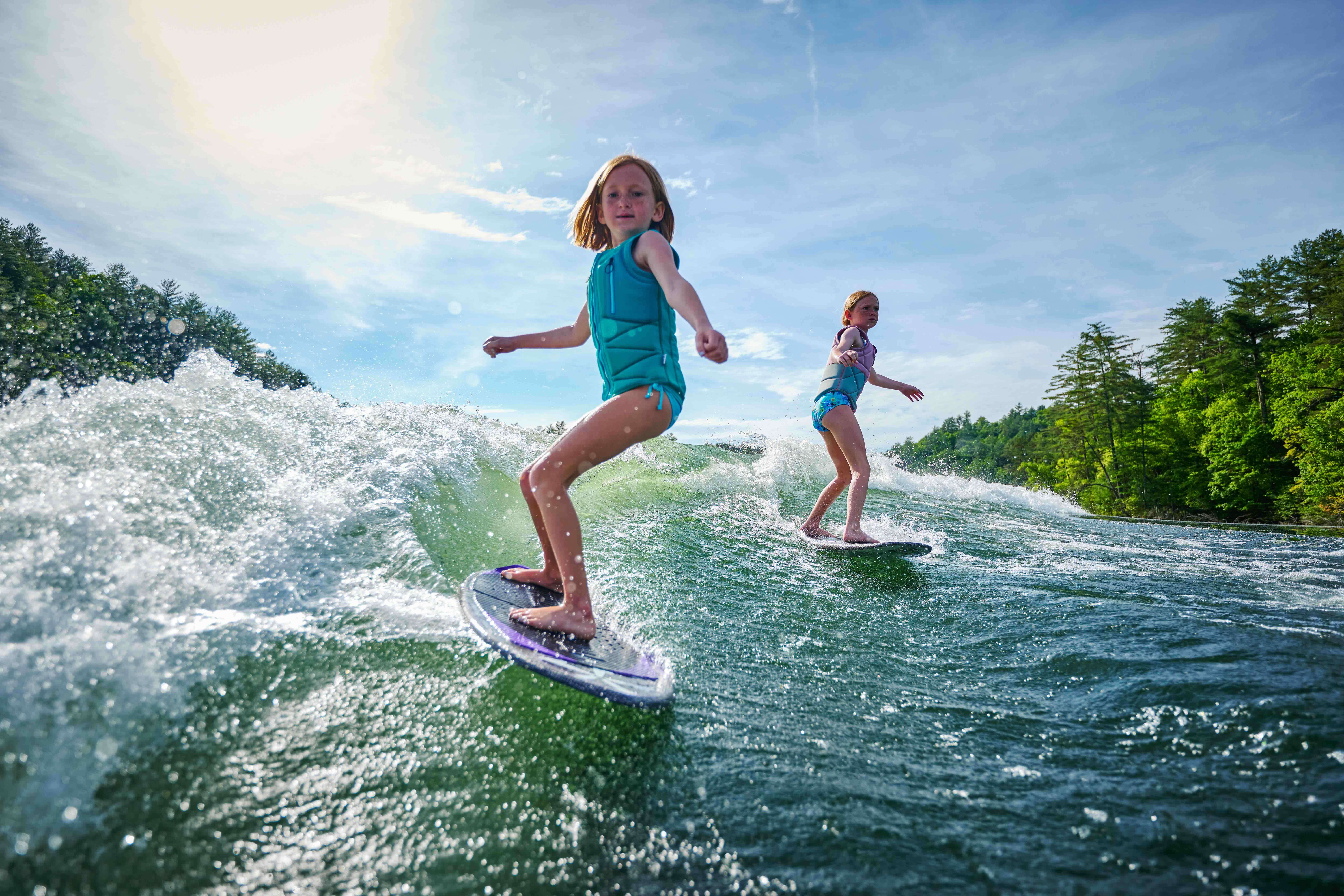Backflip into the lake on the brand new malibu boat.
