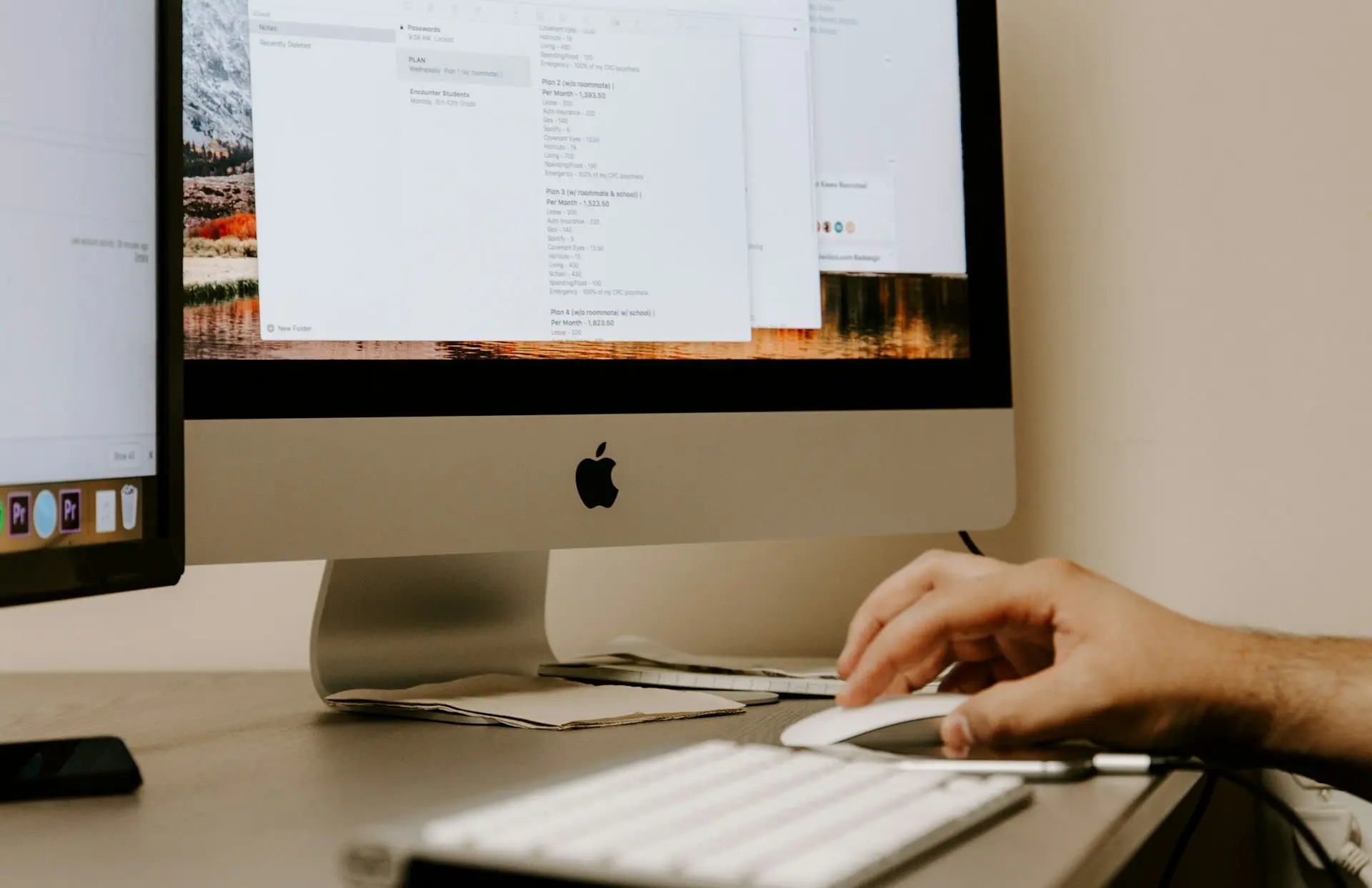 Person at office desk with computer