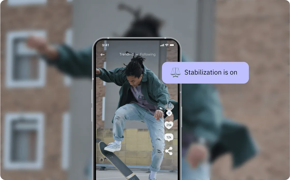 Smartphone screen showing a video of a skateboarder performing a trick, with an overlay message stating stabilization is on.
