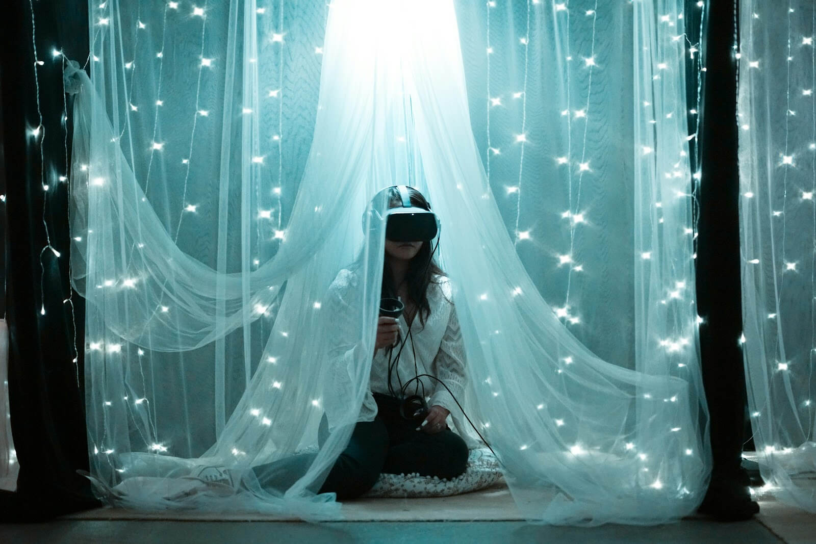 Woman wearing VR headset interacts with virtual AI
