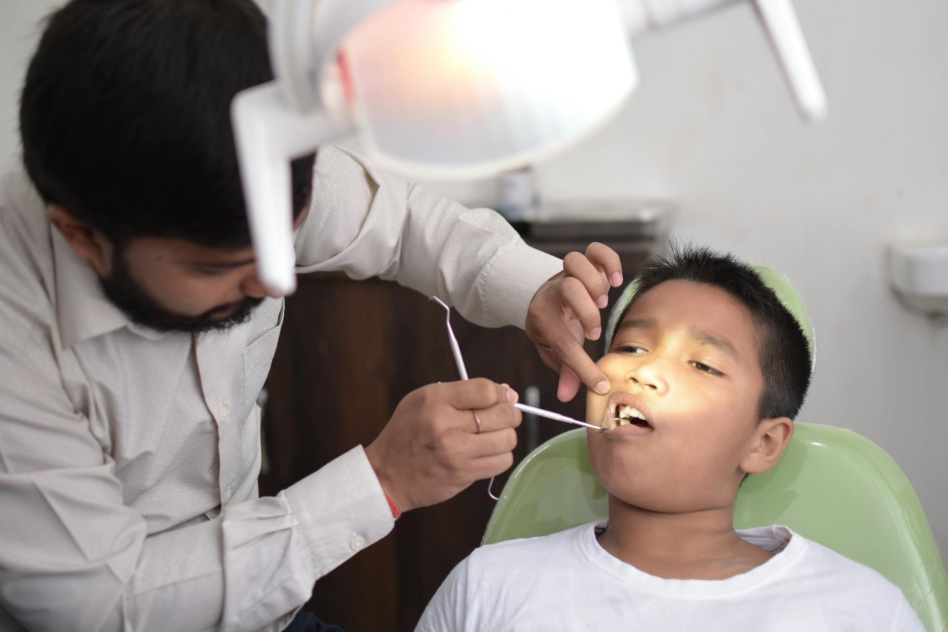dental photography showing cavities in children, with modern dental equipment, soft