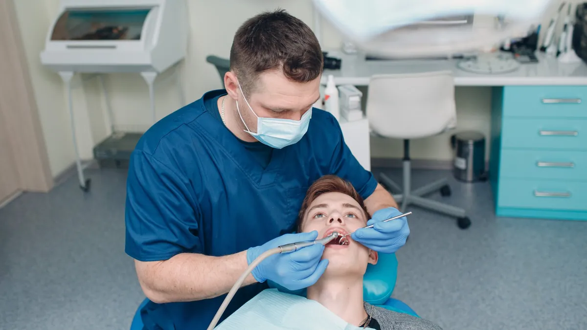 Dentist treating a patient in Lynnwood, WA