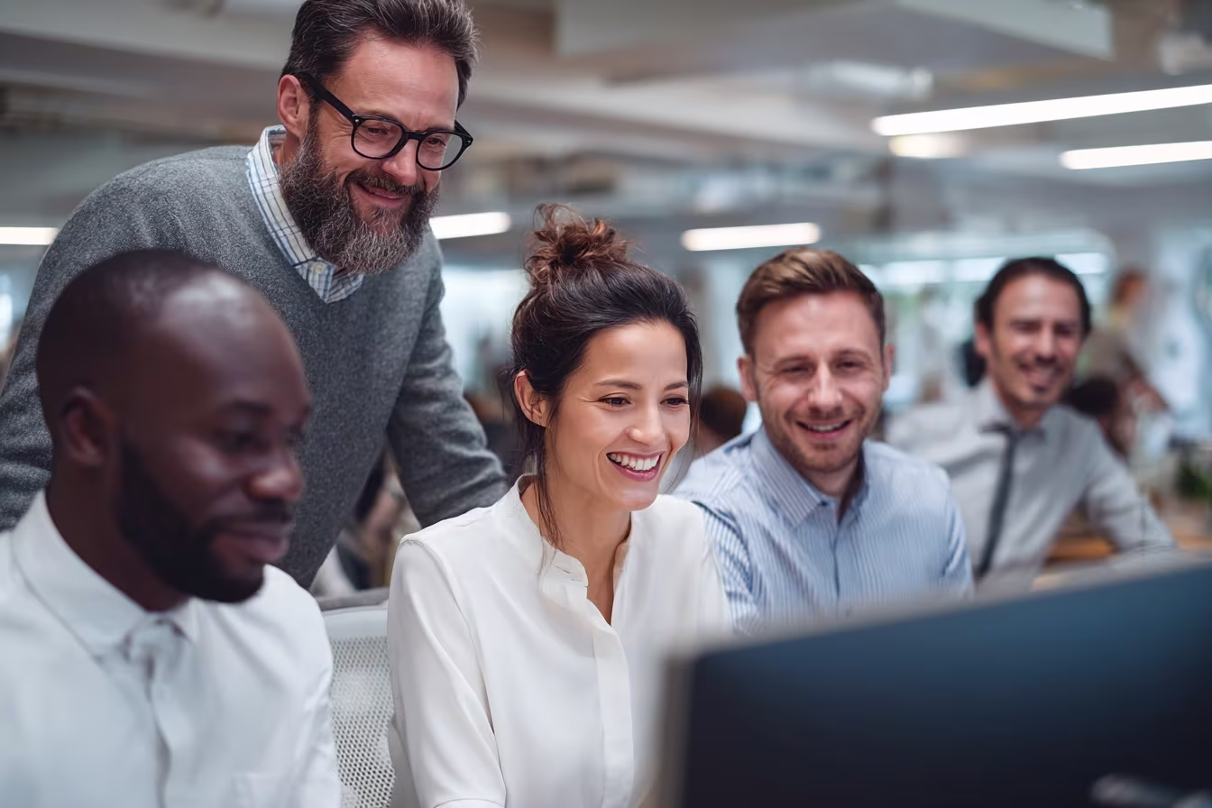 Diverse team discussing endpoint security management
