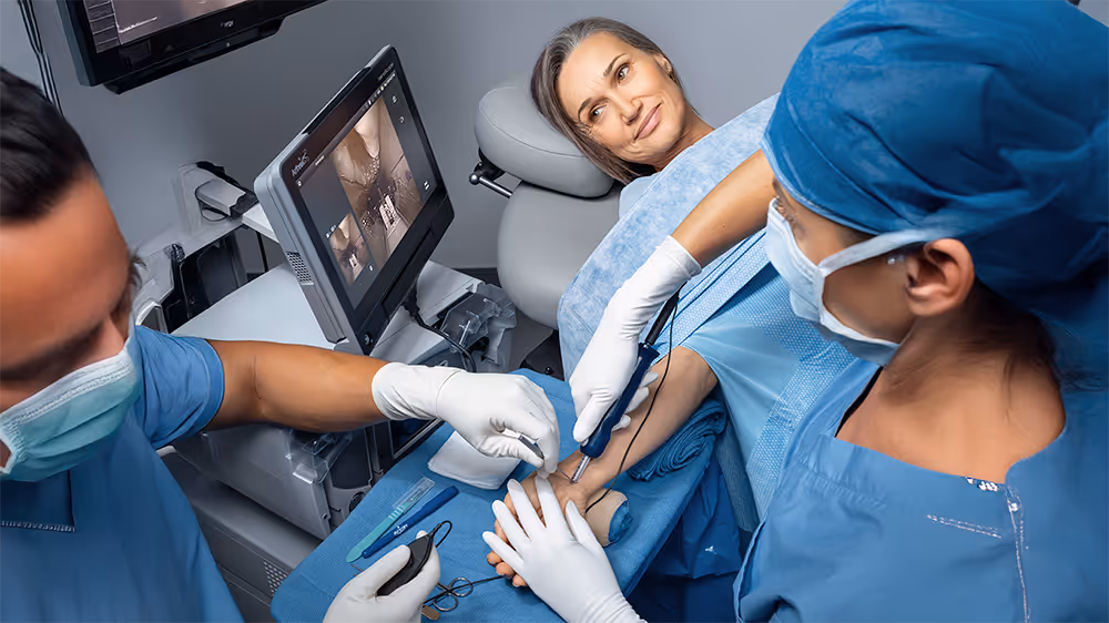  Surgical operating room with orthopedic specialist observing student