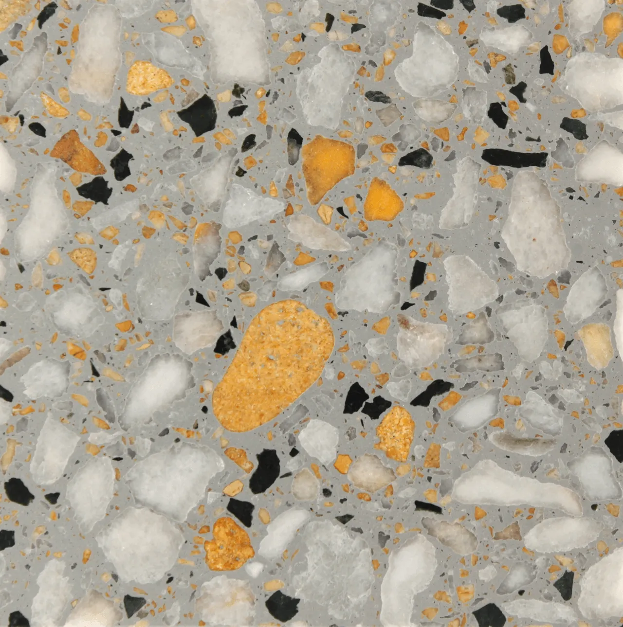 terrazzo epoxi em resina na cor cinzento, com inertes brancos e dourados / epoxy terrazzo with gray matrix base and stones in gold and white.
