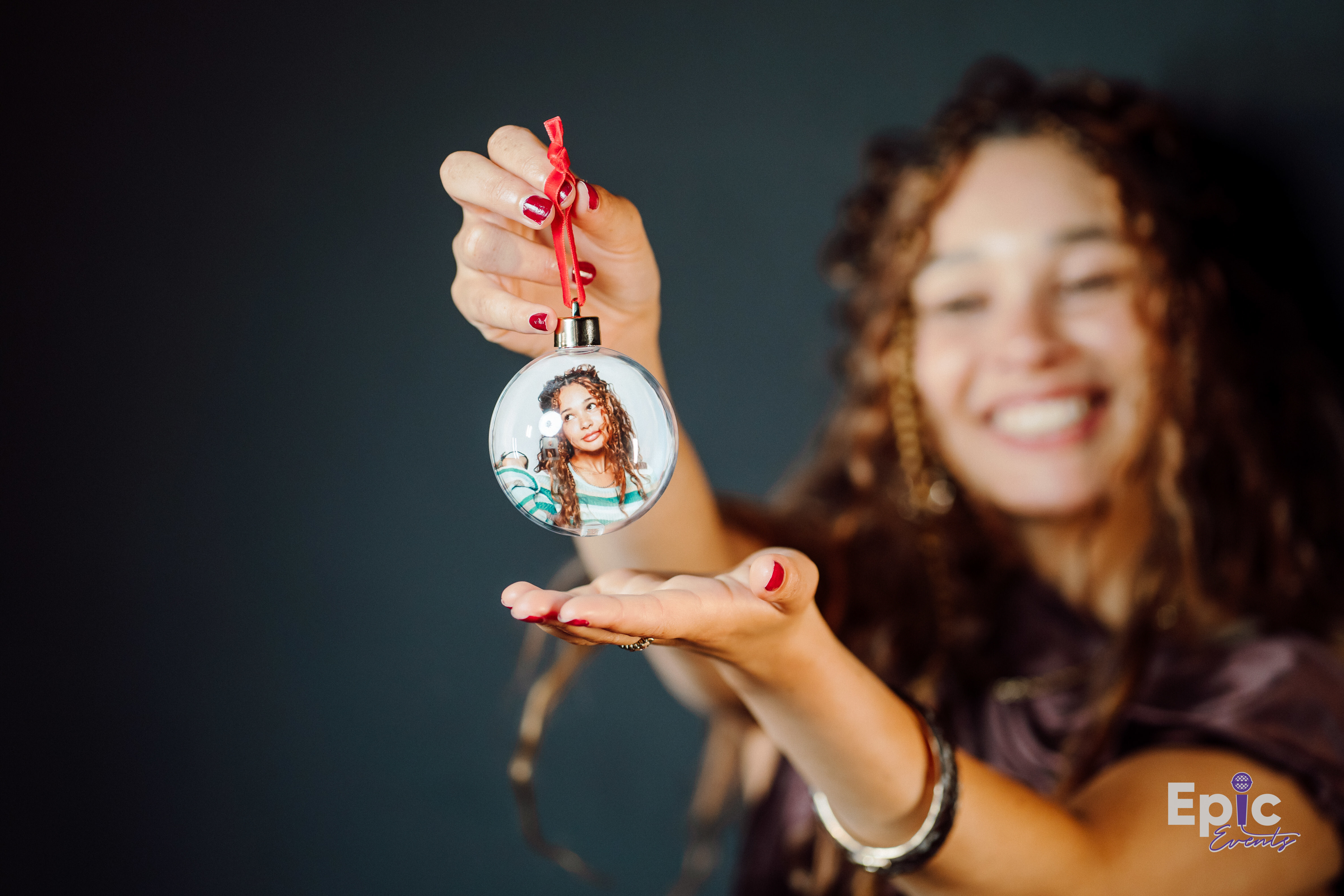 Personalized Holiday Bauble photo ornaments
hanging on a Christmas tree, a holiday keepsake in
MD & VA.
