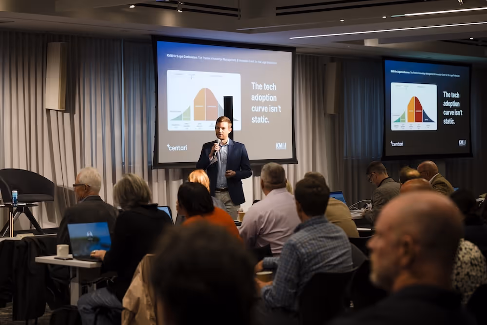 An image of Kevin Walker - Centari's Founder and CEO giving a presentation.