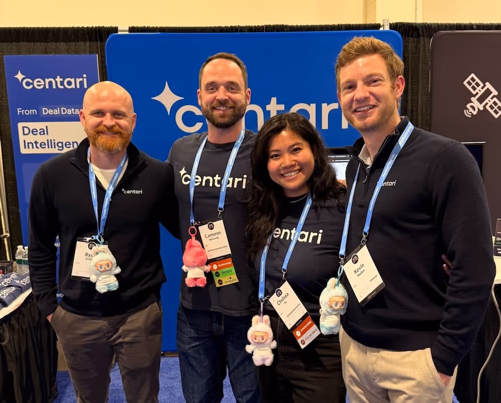 A group photo of the Centari team at a conference.