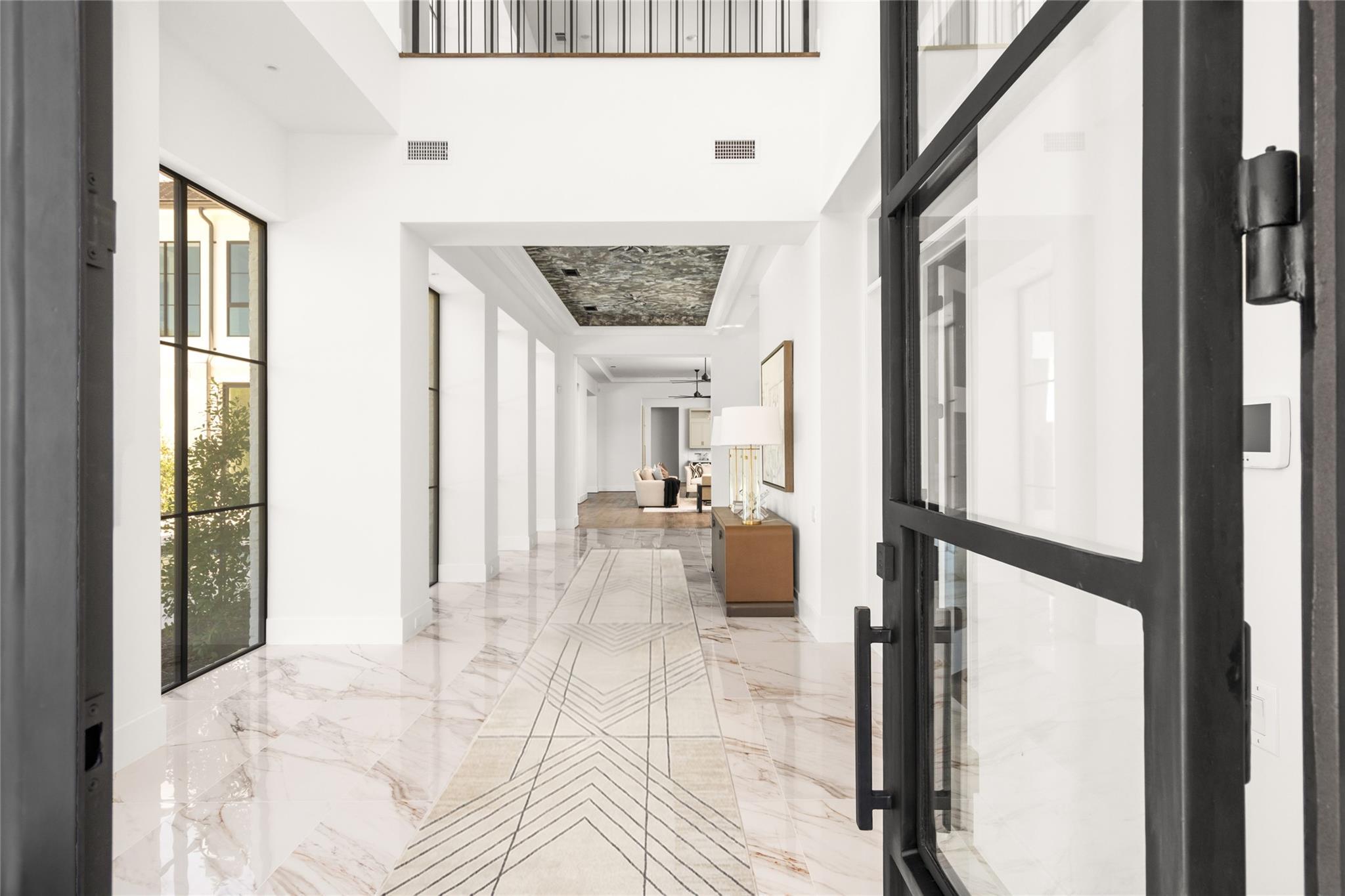 Natural stone flooring in a residential hallway