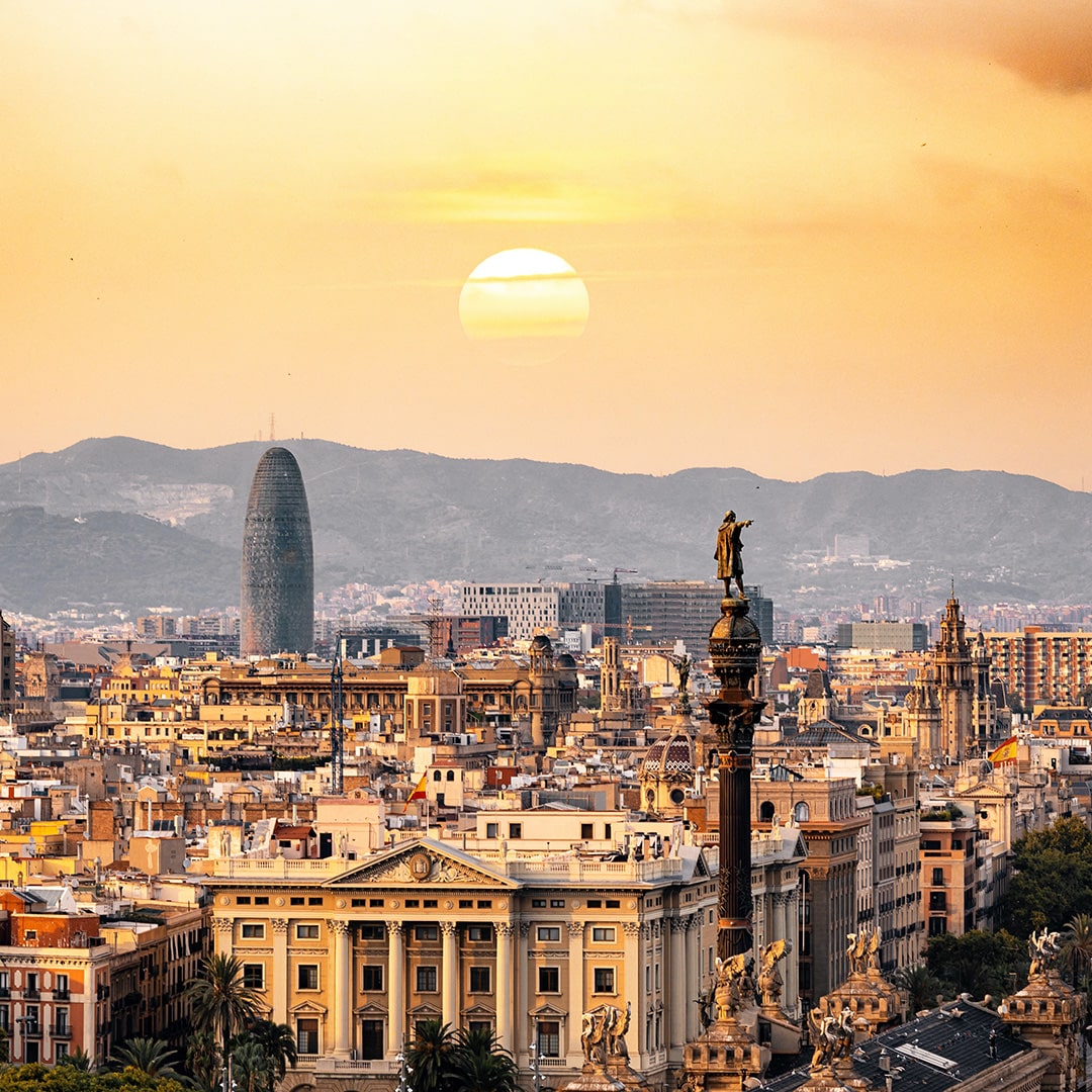 image of a spanish city under a setting sun